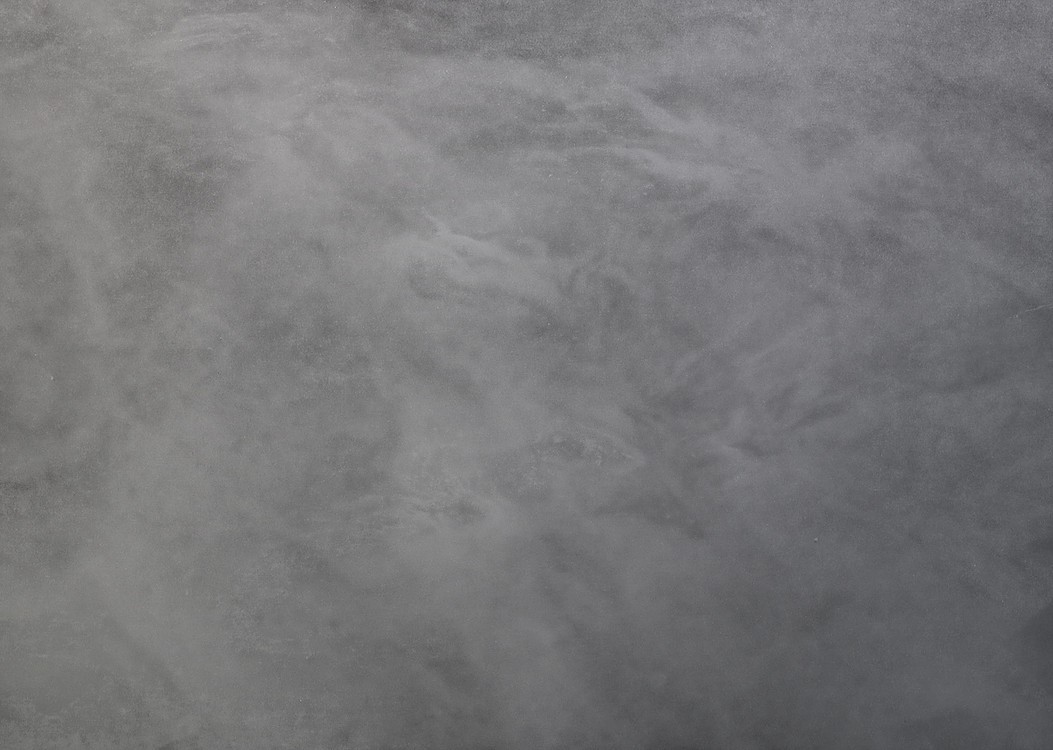 Smooth grey metallic epoxy finish with soft cloudy movement through the surface